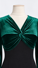 Bottle green velvet V-neckline close-up