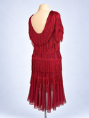 Deep scoop back with fringe tiers