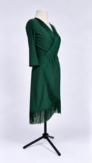 Green fringe wrap dress three-quarter angle