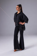 An oversized black blouse for dancing