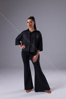 An oversized black blouse for dancing