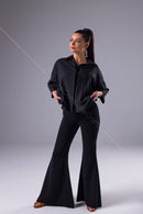 An oversized black blouse for dancing