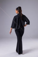 An oversized black blouse for dancing