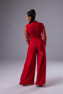 Red jumpsuit with mesh sleeves