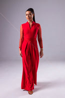 Red jumpsuit with mesh sleeves