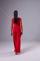 Red jumpsuit with mesh sleeves