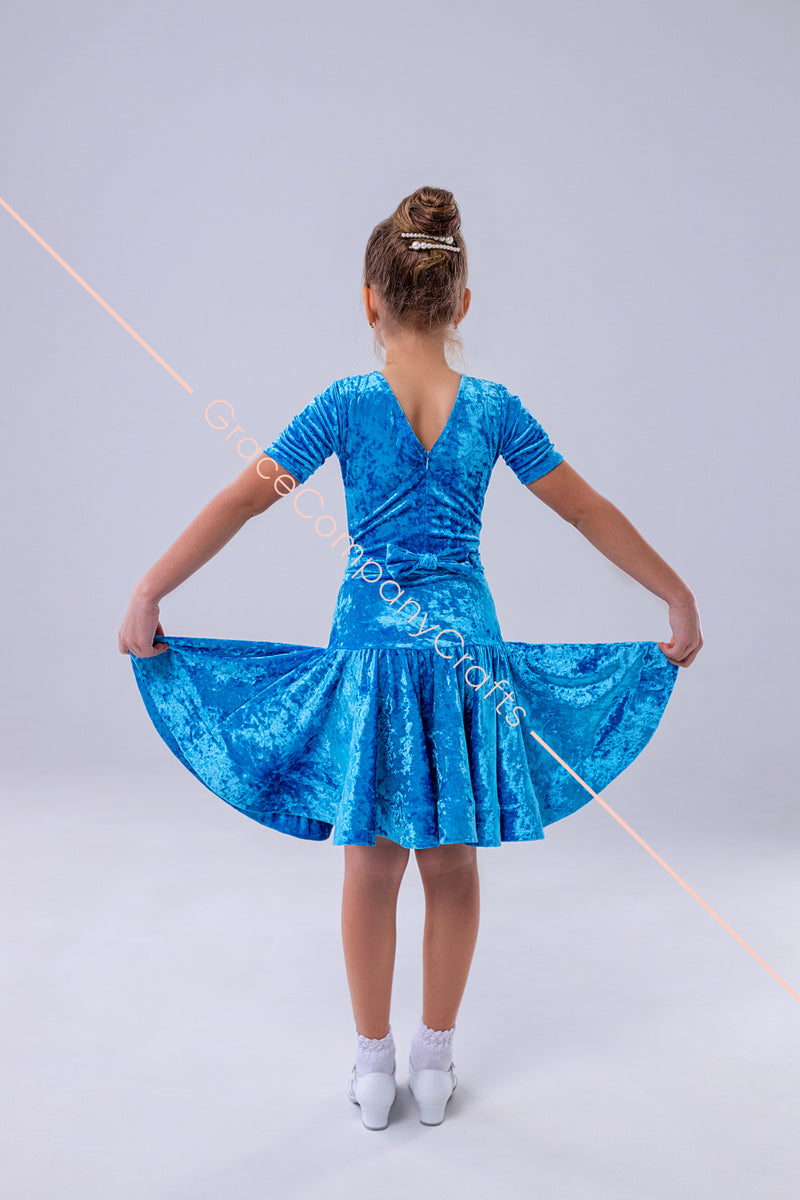 Blue dress for the dance floor made of velor, with a bow